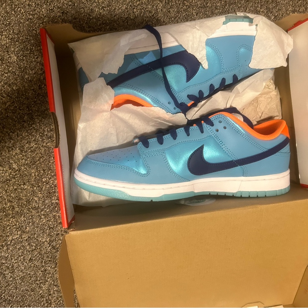 Nike Blue and Orange Sneakers with Eye-Catching Design